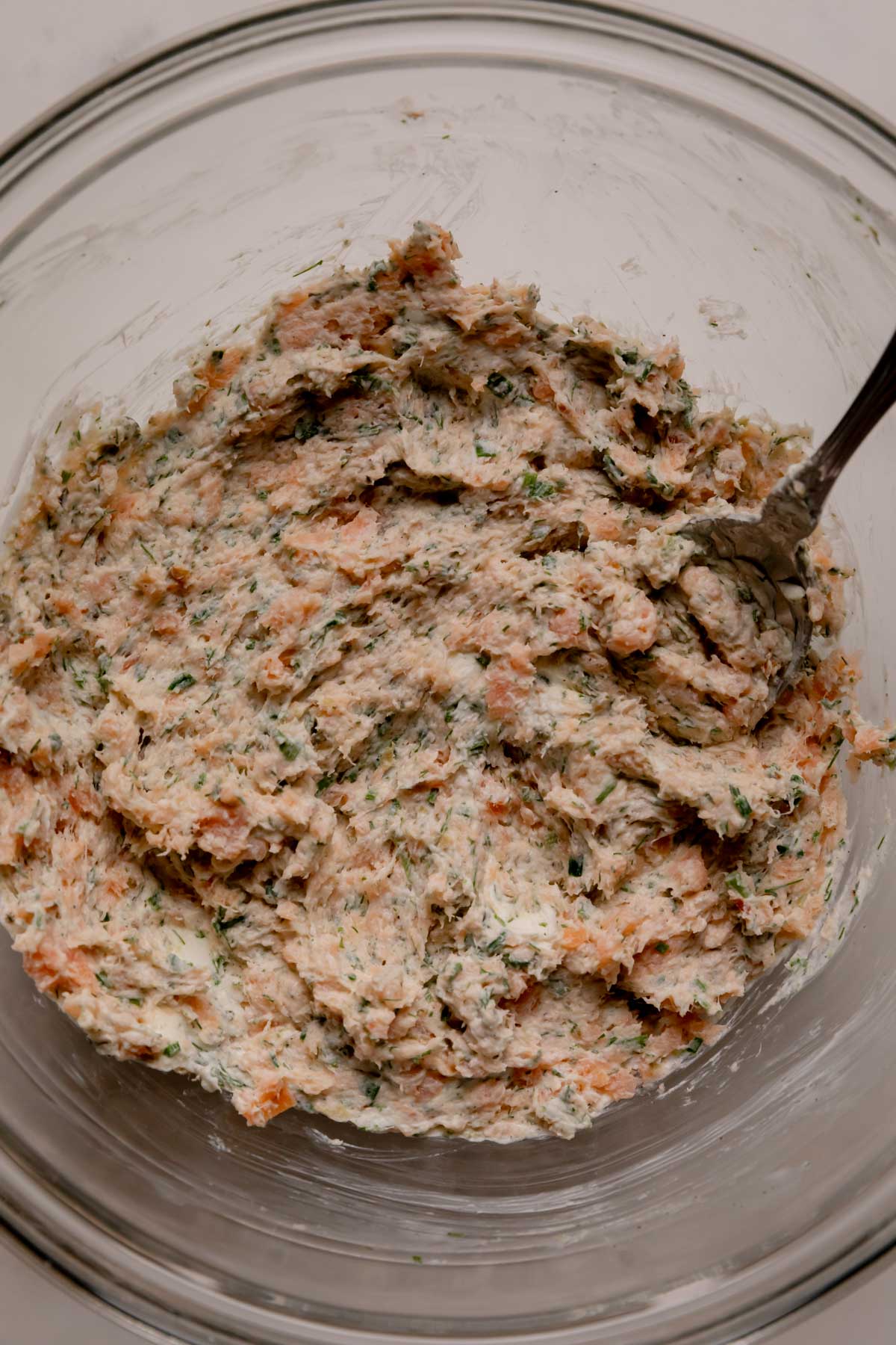 A bowl of smoked salmon and cream cheese filling.