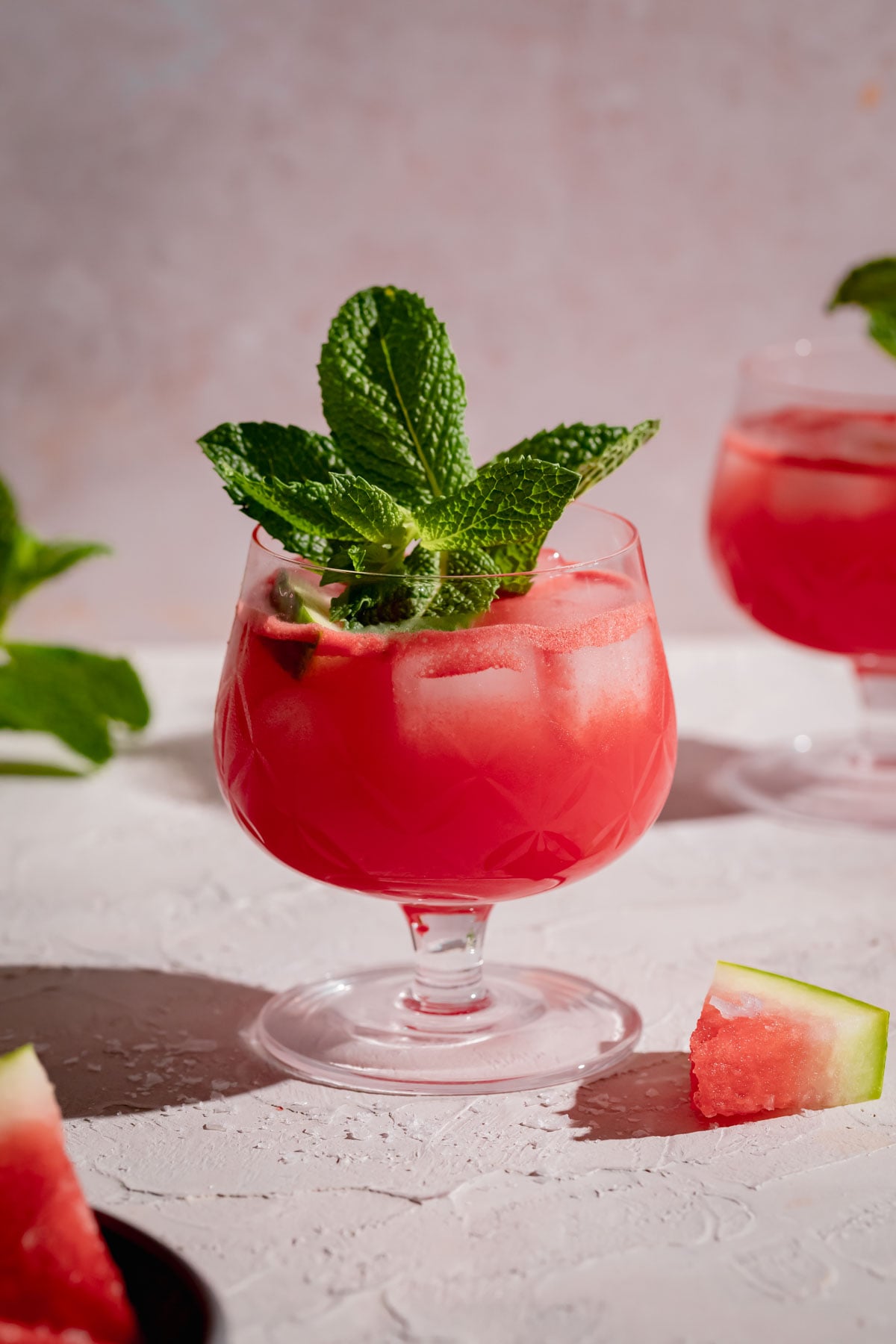 Salted Watermelon Juice in glasses with a mint garnish.
