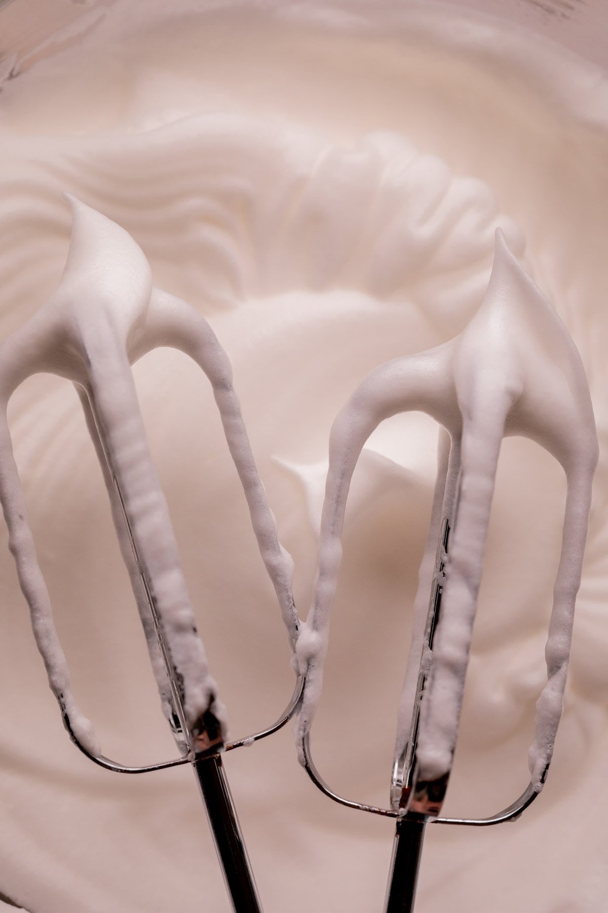 Beaters with stiff peaked egg whites.