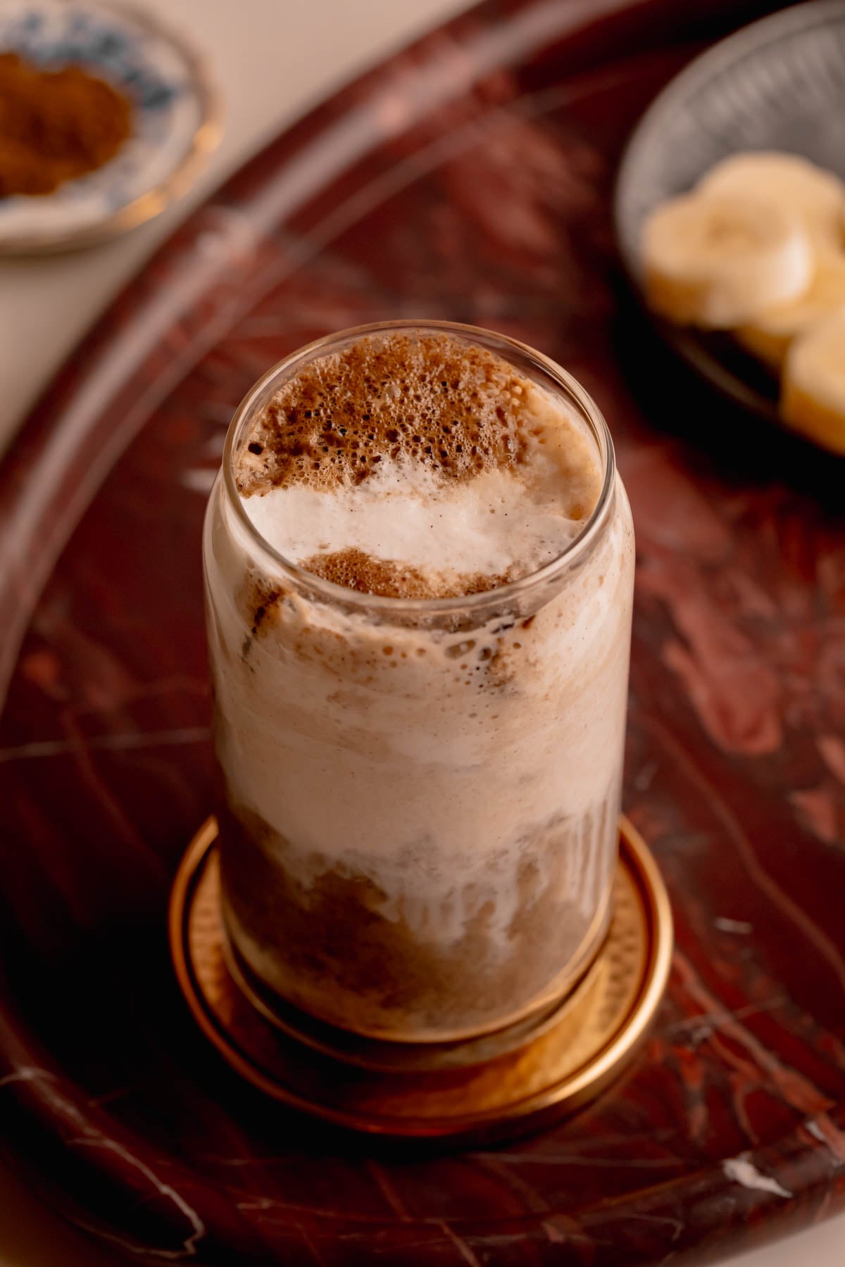 Roasted Banana Hojicha Latte with Salted Vanilla Cream.