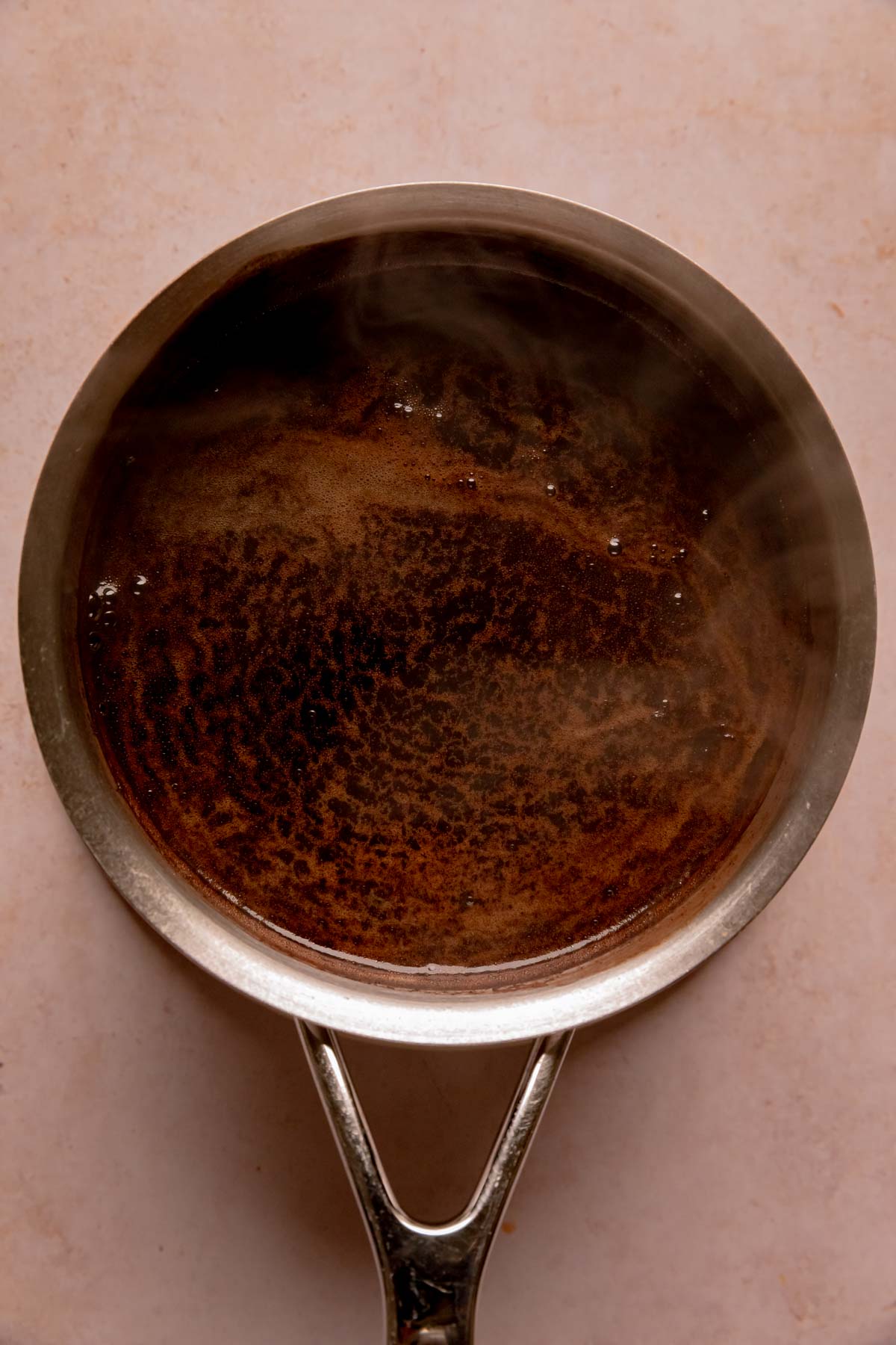 Hot coffee in a saucepan.