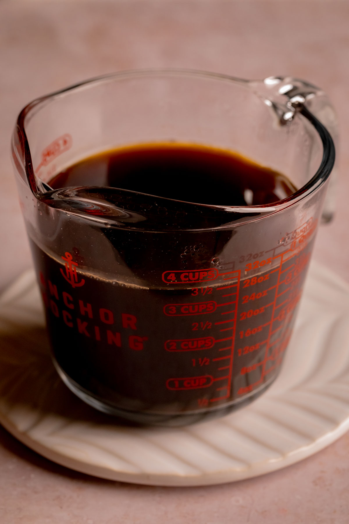 Strained coffee in a liquid measuring cup.