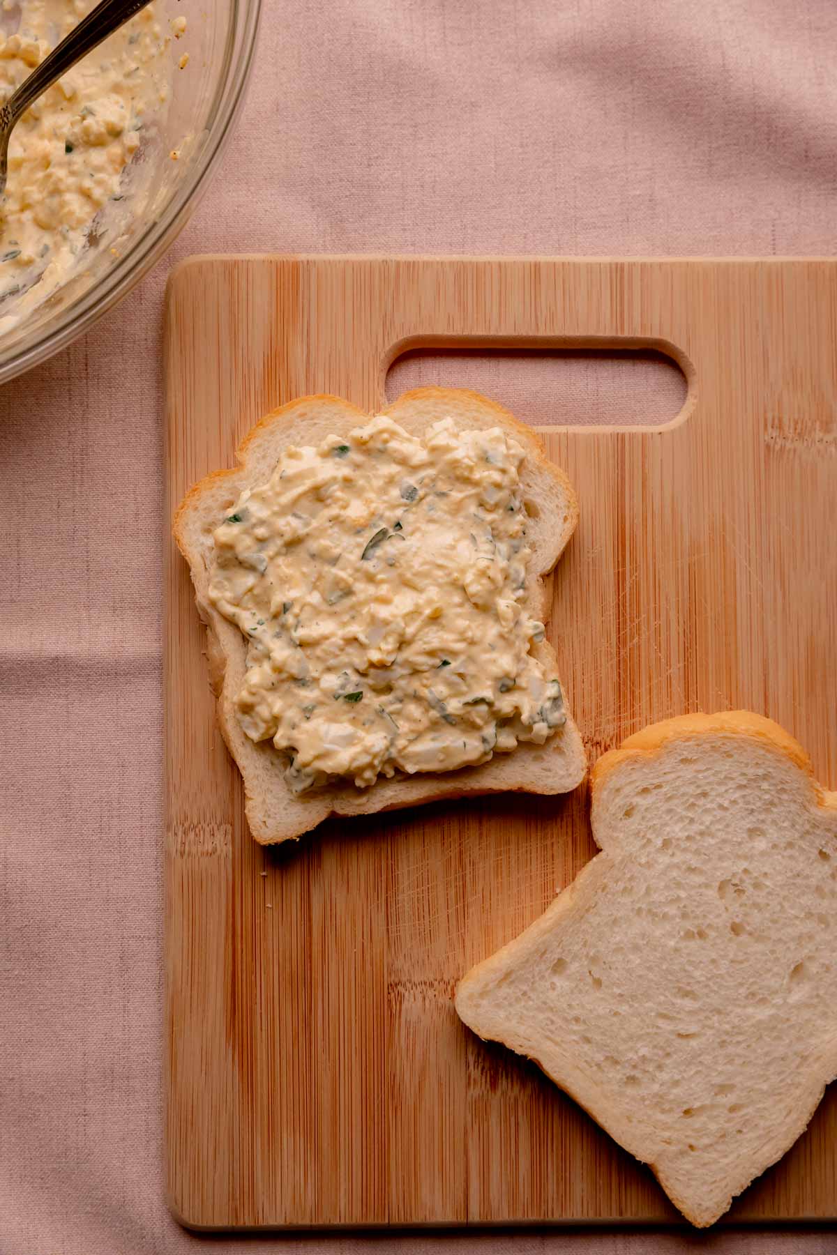 Egg salad on white sandwich bread.