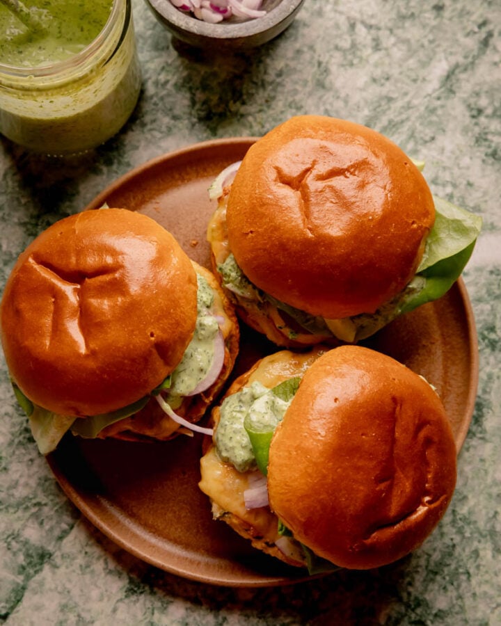Herbed Chicken Burgers with Spicy Green Goddess Sauce.