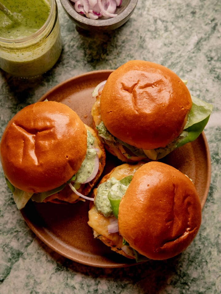 Herbed Chicken Burgers with Spicy Green Goddess Sauce.