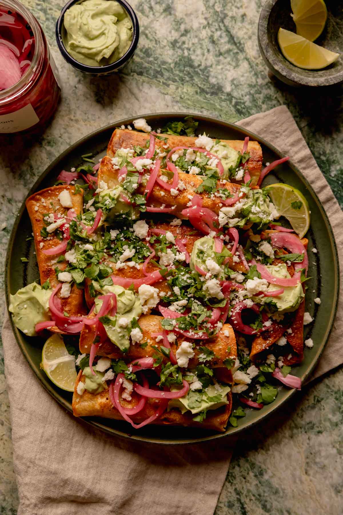 Chipotle Black Bean Flautas with Avocado Crema.