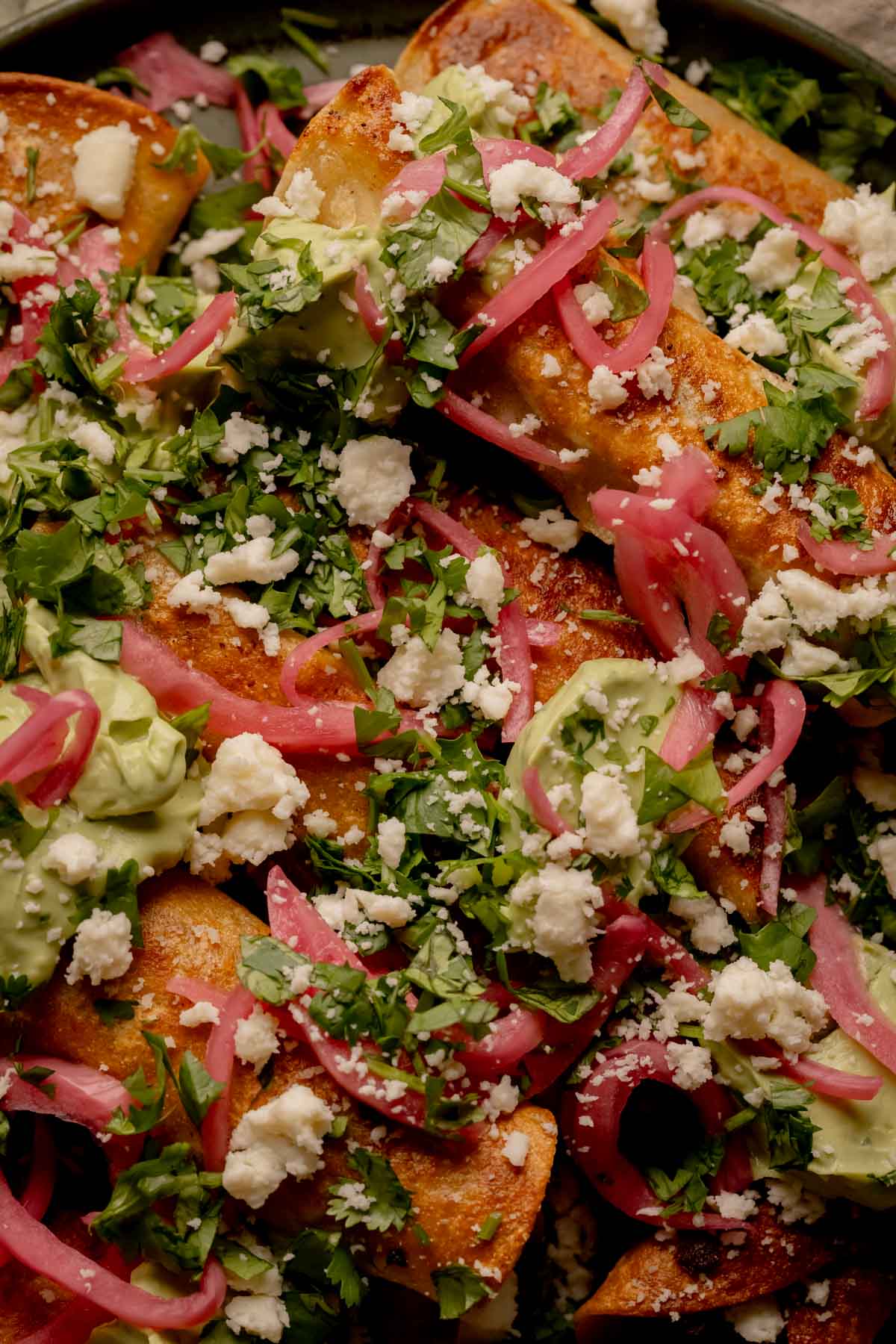 Chipotle Black Bean Flautas with Avocado Crema.
